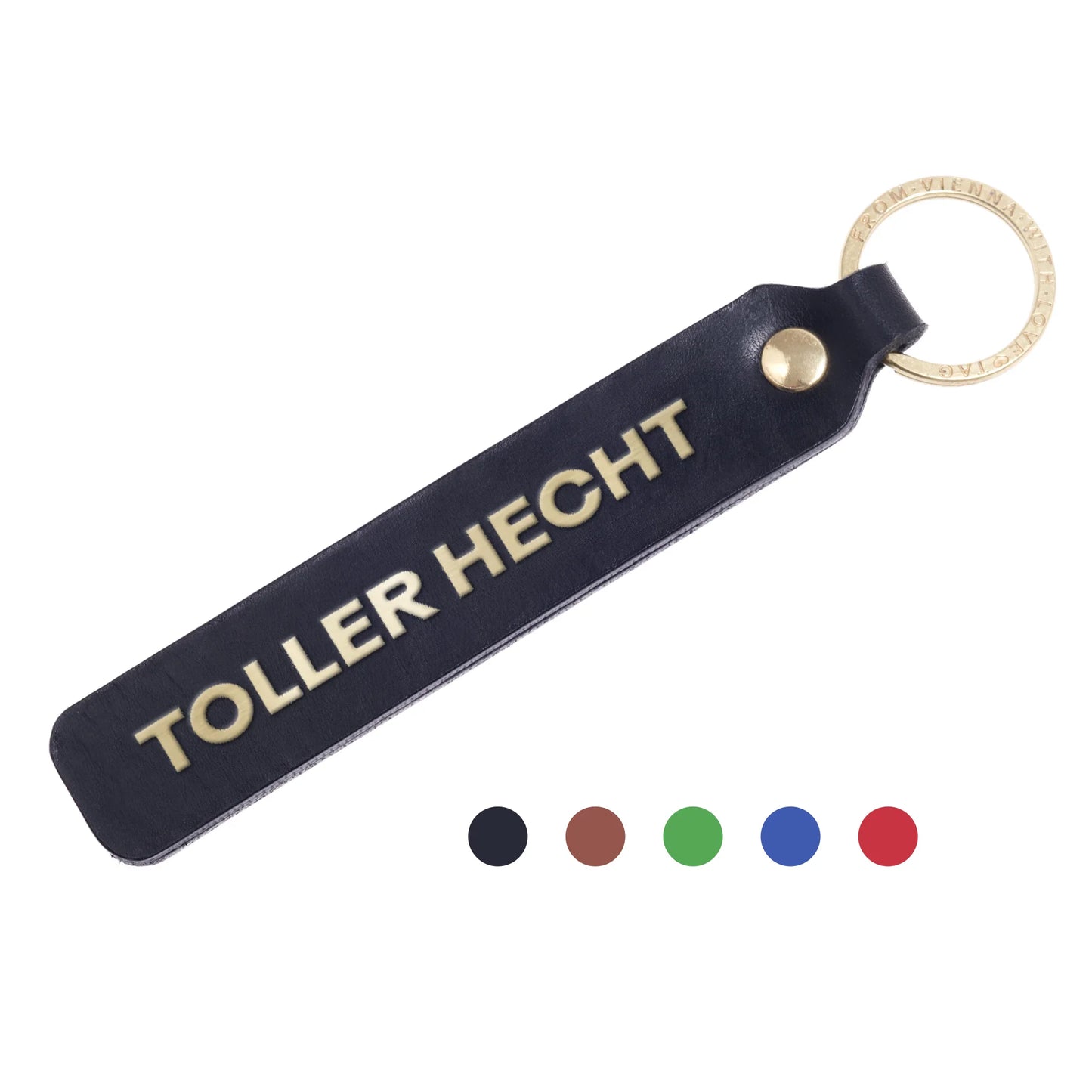 Flatlay, Schlüsselanhänger aus Leder in Schwarz mit Goldprägung 'Toller Hecht' von LoveTag, handgefertigt in Wien